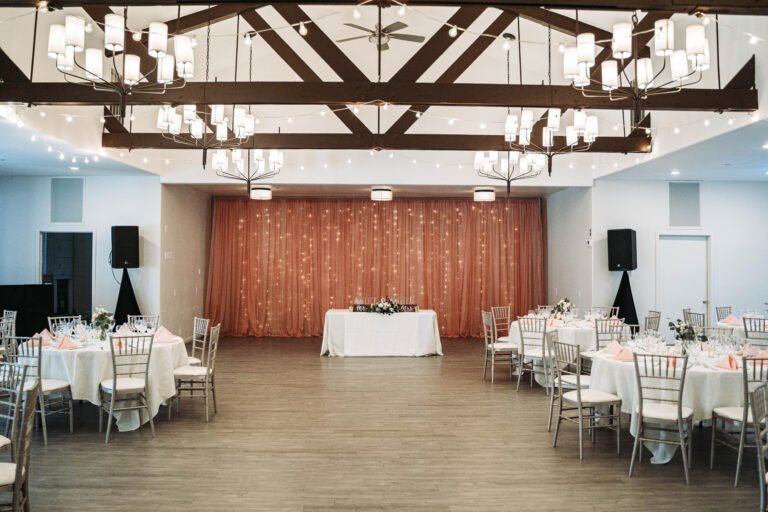 A beautifully decorated venue interior for a wedding.