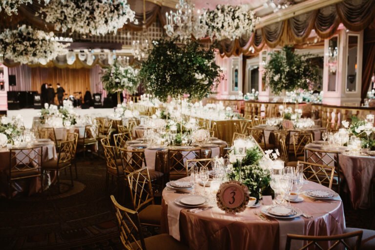 Wedding venue with rental tables and rental chairs set - up for the event.