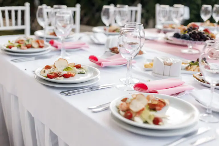 8' Banquet Table Rental Decorated in White